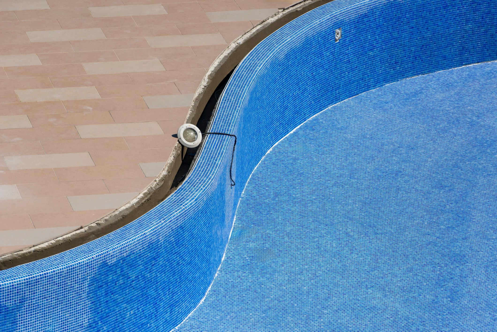 Pool service maintenance tools at a residential swimming pool