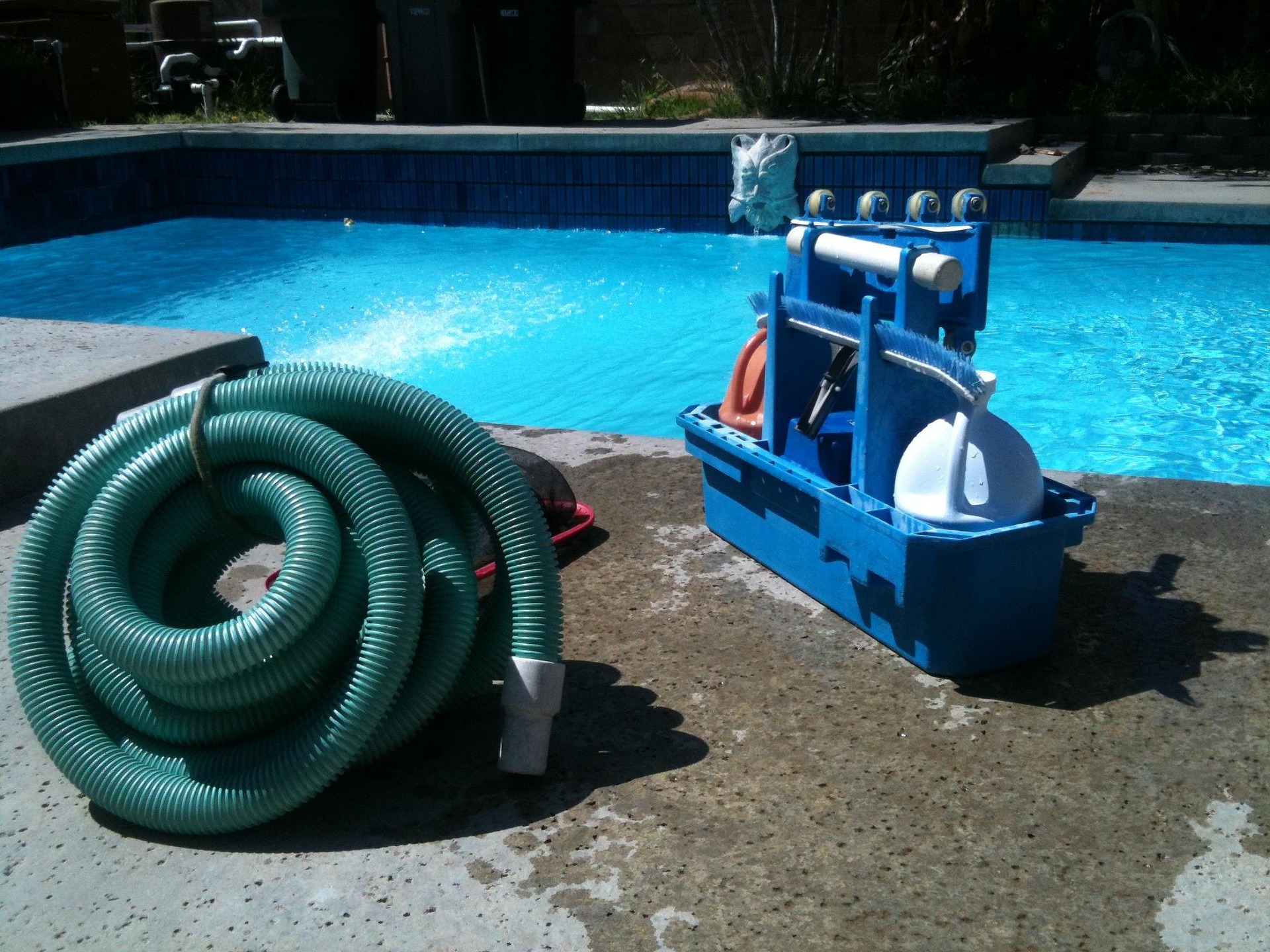 Pool cleaning service for a residential backyard pool